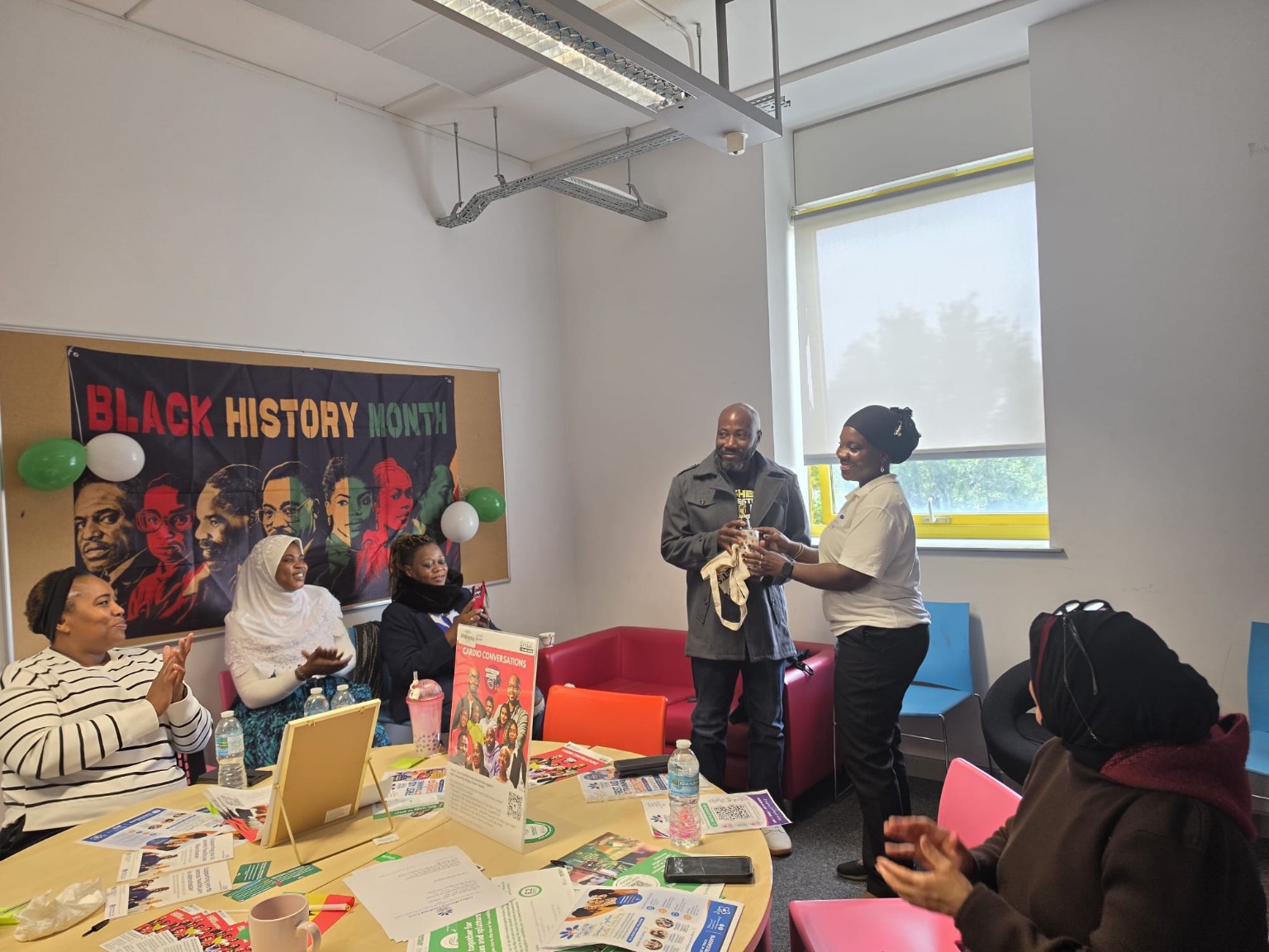 Sharing a moment at the coffee morning — 6 October 2026